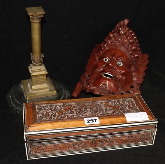 An Indian sandalwood box, a Chinese carved head and a model of a triumphal column